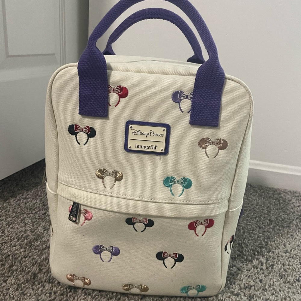 Loungefly Disney Parks Cream Backpack with Colorful Bow Accents